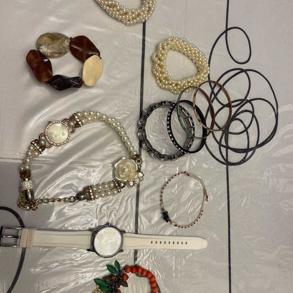 Bundle of watches and bracelets